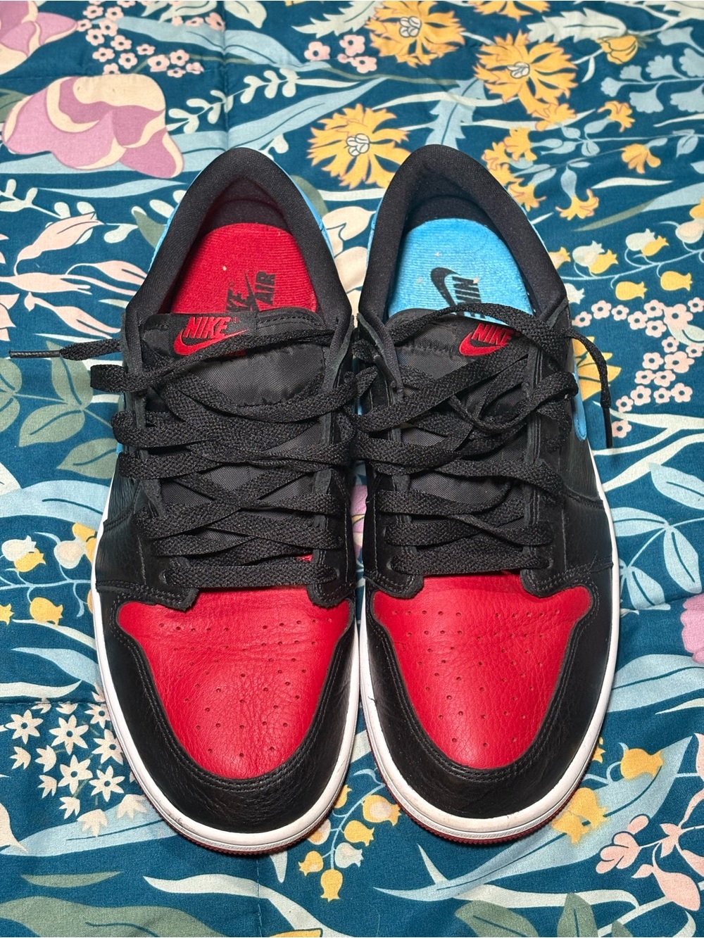 Nike Jordan 1 Lows Women’s Black & Red Sneakers with Blue/Red Insole Detail